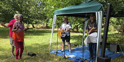 Couple dancing at Mid Sussex Labour Garden Party